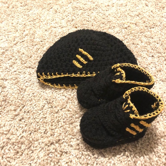 black and gold baby shoes